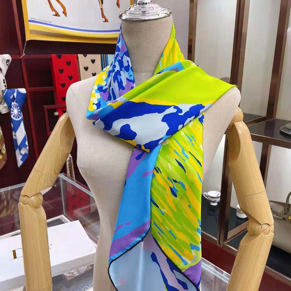 Close-up detail of vibrant colors on Dior Women D-Wood Square Scarf