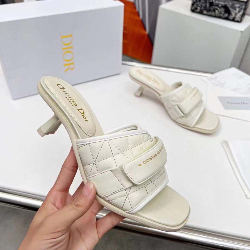 Close-up of signature white quilted Cannage stitching on Dior Women Dio(r)evolution slide