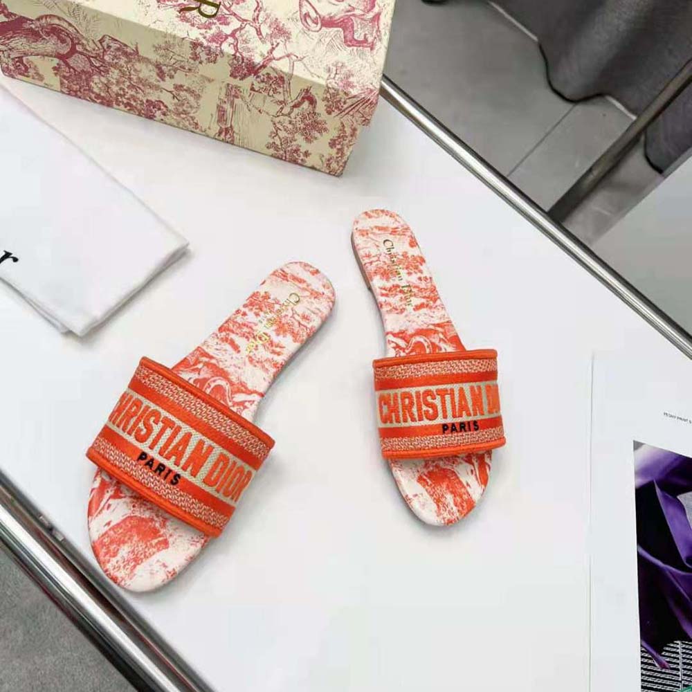 Close-up detail of embroidery on Dior Women Dway Slide Bright Orange Toile De Jouy Embroidered Cotton