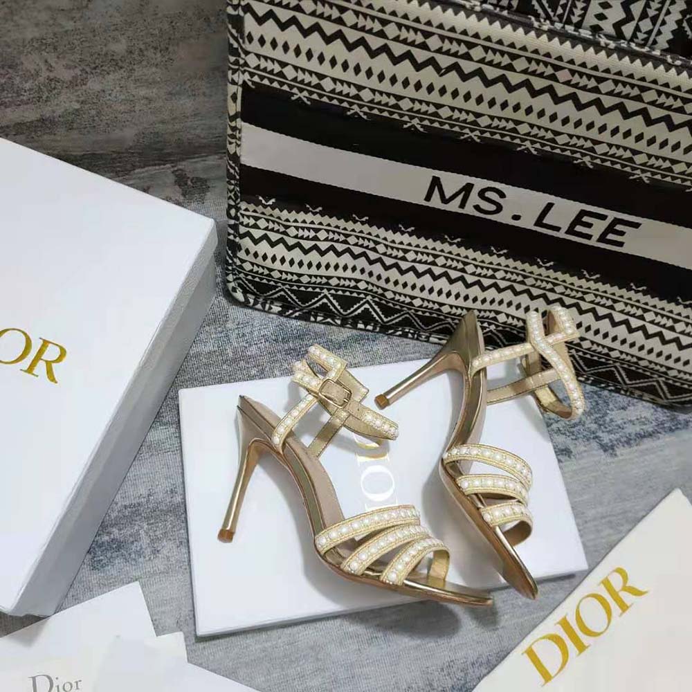 Back view showing black heel and ankle buckle on Dior Women Gem Heeled Sandal