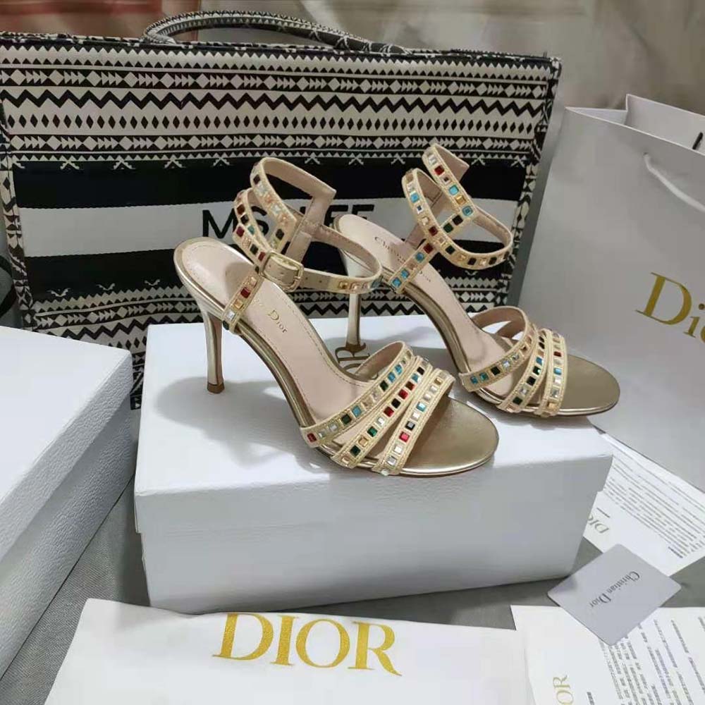 Close-up of gold-tone buckle on Dior Women Gem Heeled Sandal
