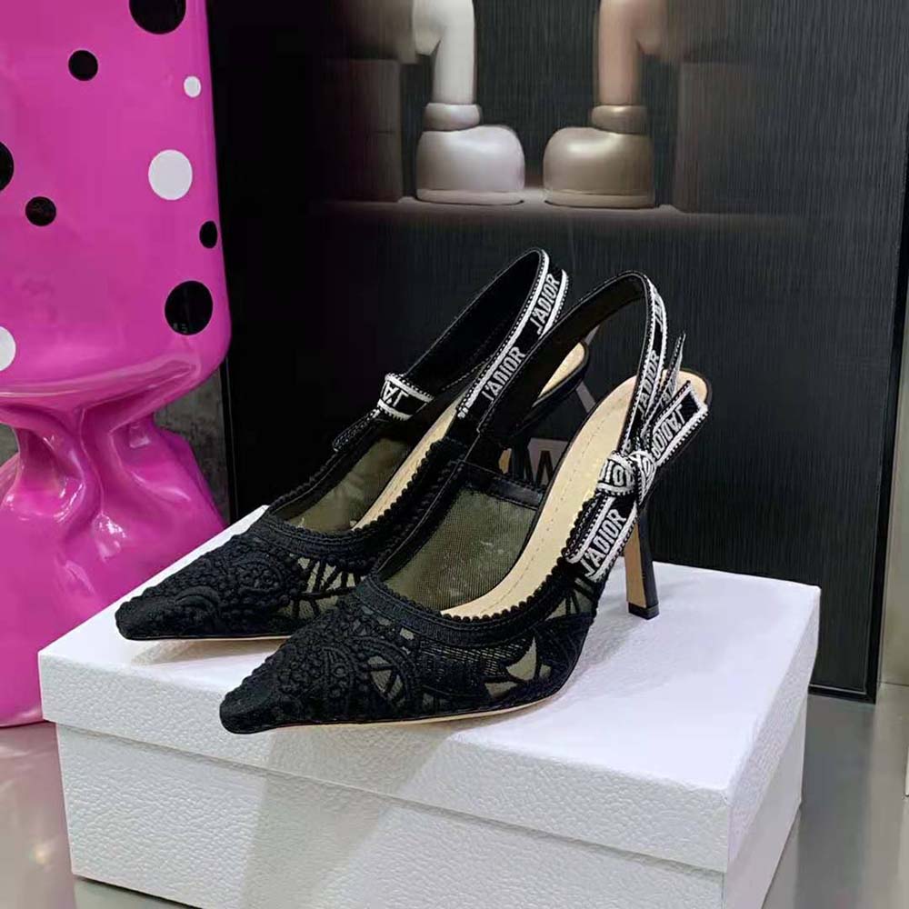 Rear shot showing silver ‘J Adior’ hardware on black slingback pump