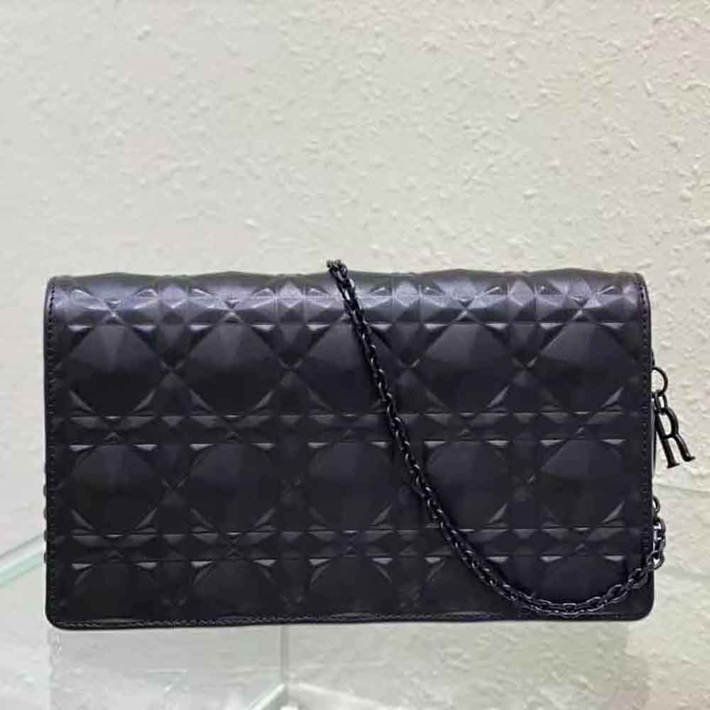 Side angle showing zipper and silver hardware on Dior Women Lady Dior Pouch black