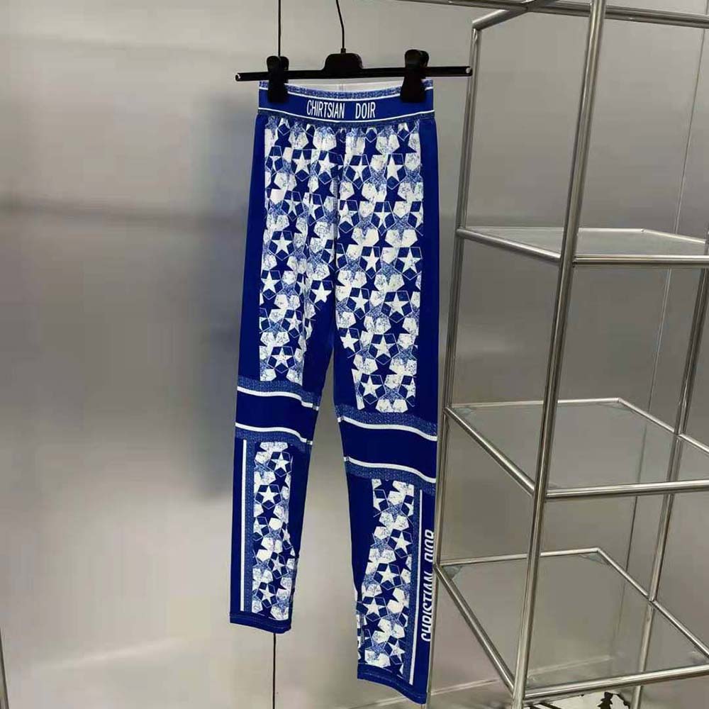 Side angle showcasing stretch and fit of Dior Women Leggings Fluorescent Blue
