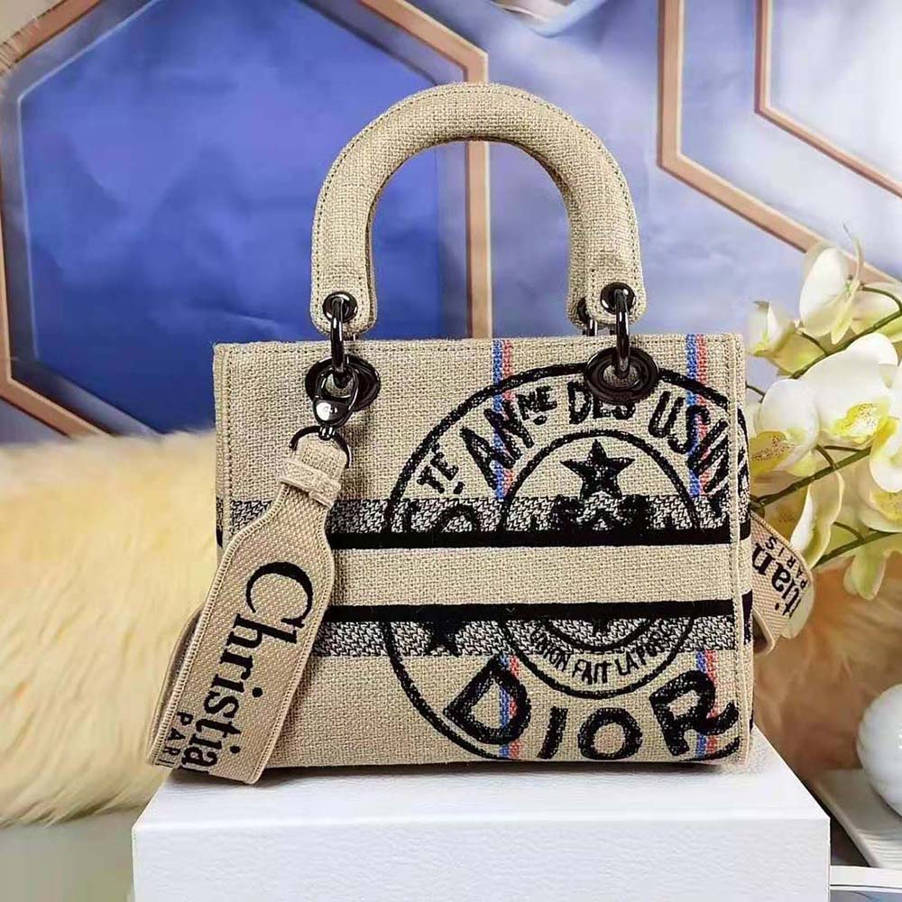 Side angle showing silhouette and silver-tone hardware of Dior Medium Lady D-Lite Bag