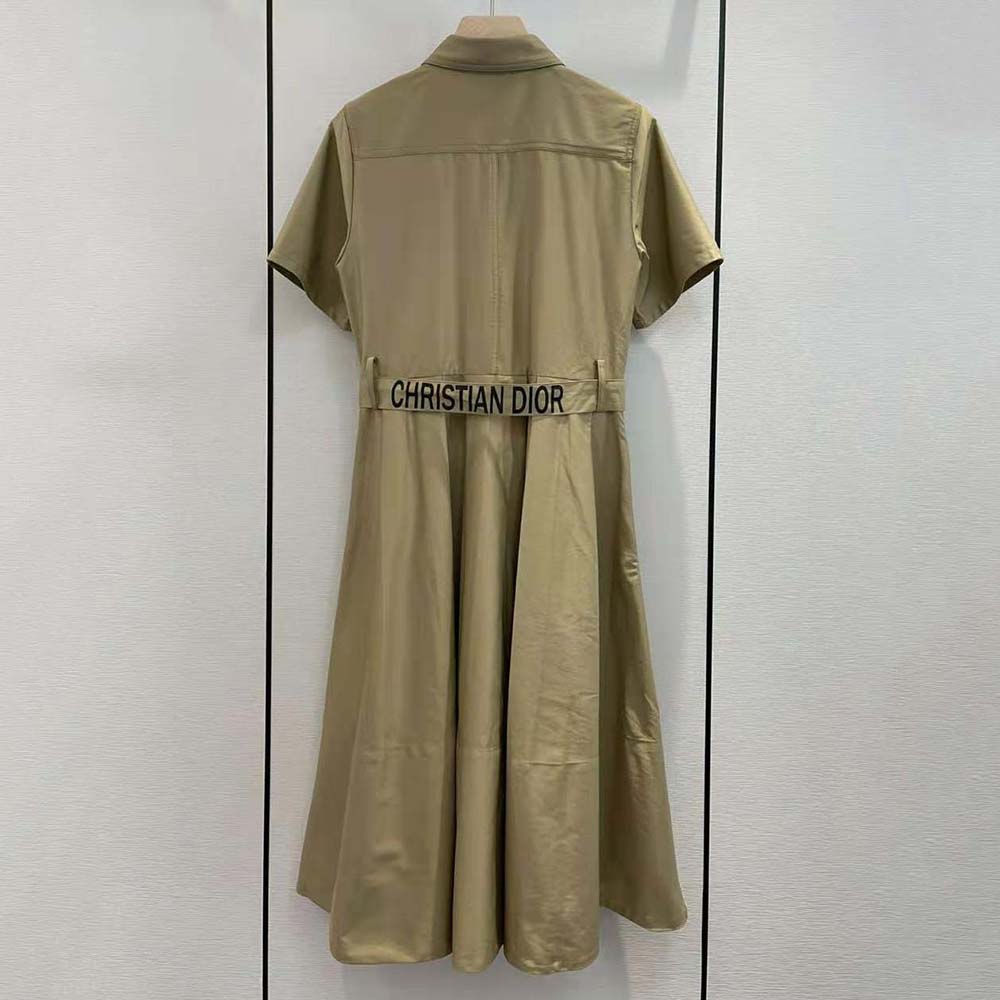 Side angle showing silhouette of Dior Women Mid-Length Pleated Dress