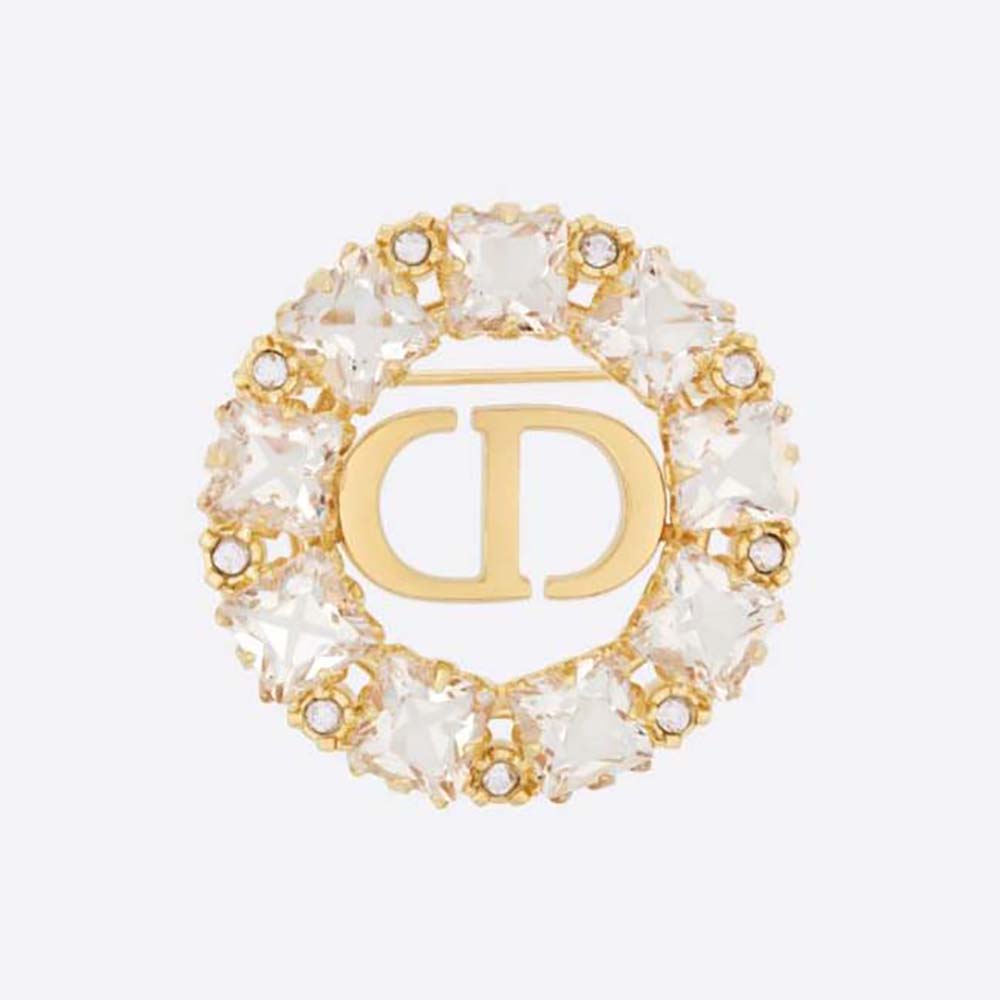 Close-up of Dior Women Petit CD Brooch gold-finish with crystals