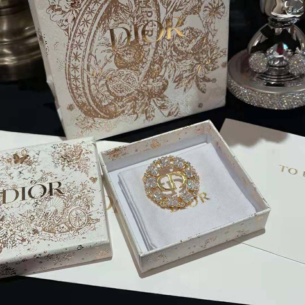 Side angle showing 'CD' crystal logo on Dior Women Petit CD Brooch