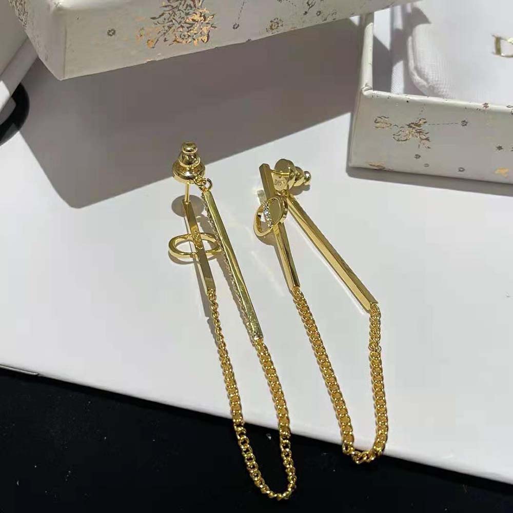 Side angle showing butterfly closure on Dior Women Petit CD Earrings Gold-Finish Metal