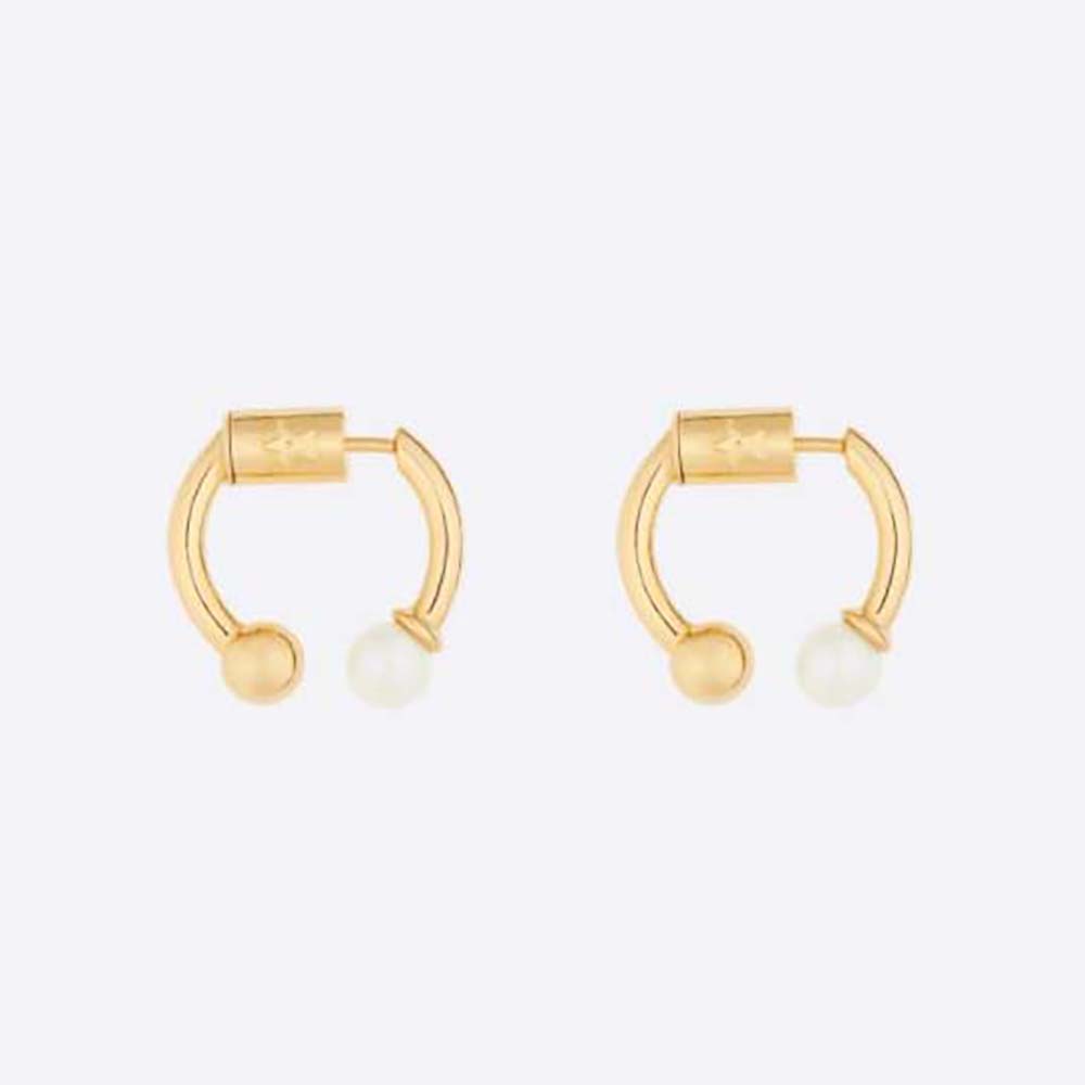 Close-up of Dior Women Petit CD Earrings with gold-finish metal
