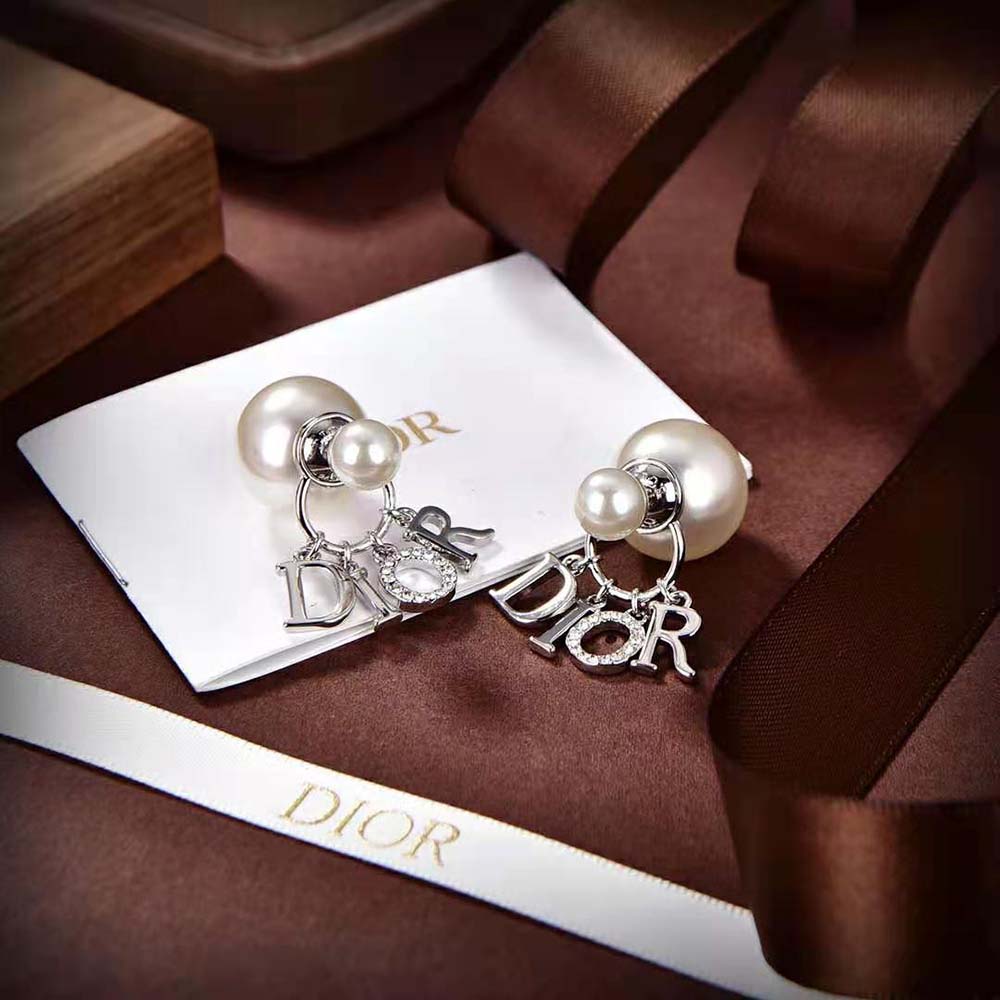 Close-up detail of white resin pearls and crystals on Dior Tribales Earrings