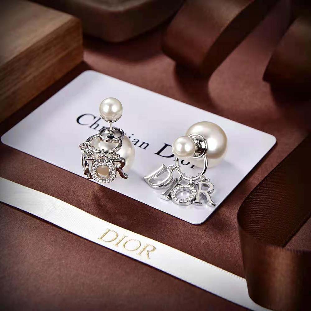 Side angle showing double-sided design of Dior Women Tribales Earrings