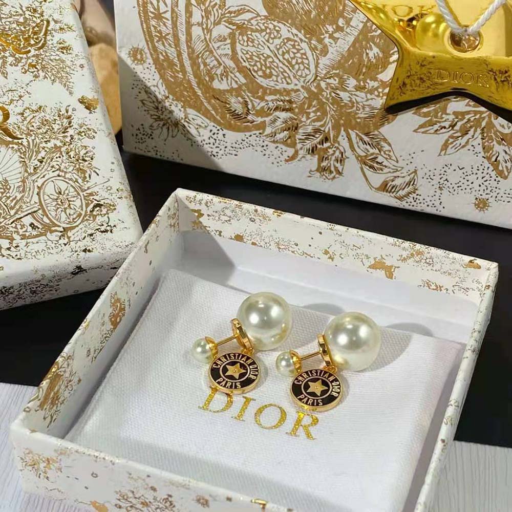 Side angle highlighting double-sided design of Dior Women Tribales Earrings
