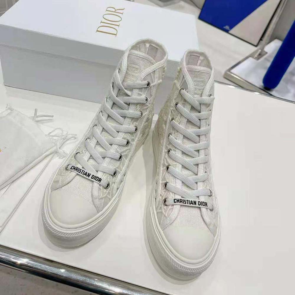 Close-up detail of macramé embroidery on Dior Women Walk N Dior sneaker