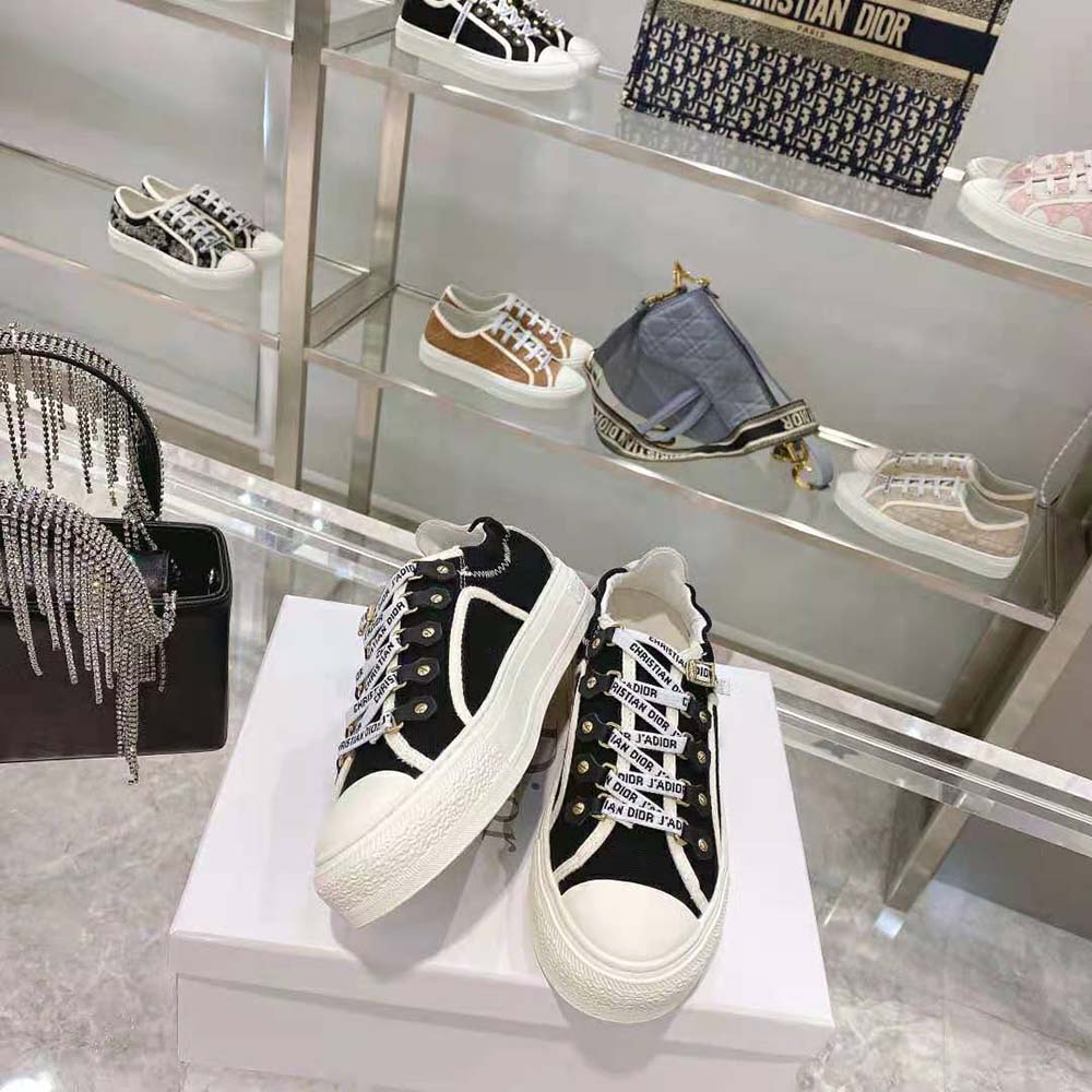Overhead view showing black canvas and white suede materials