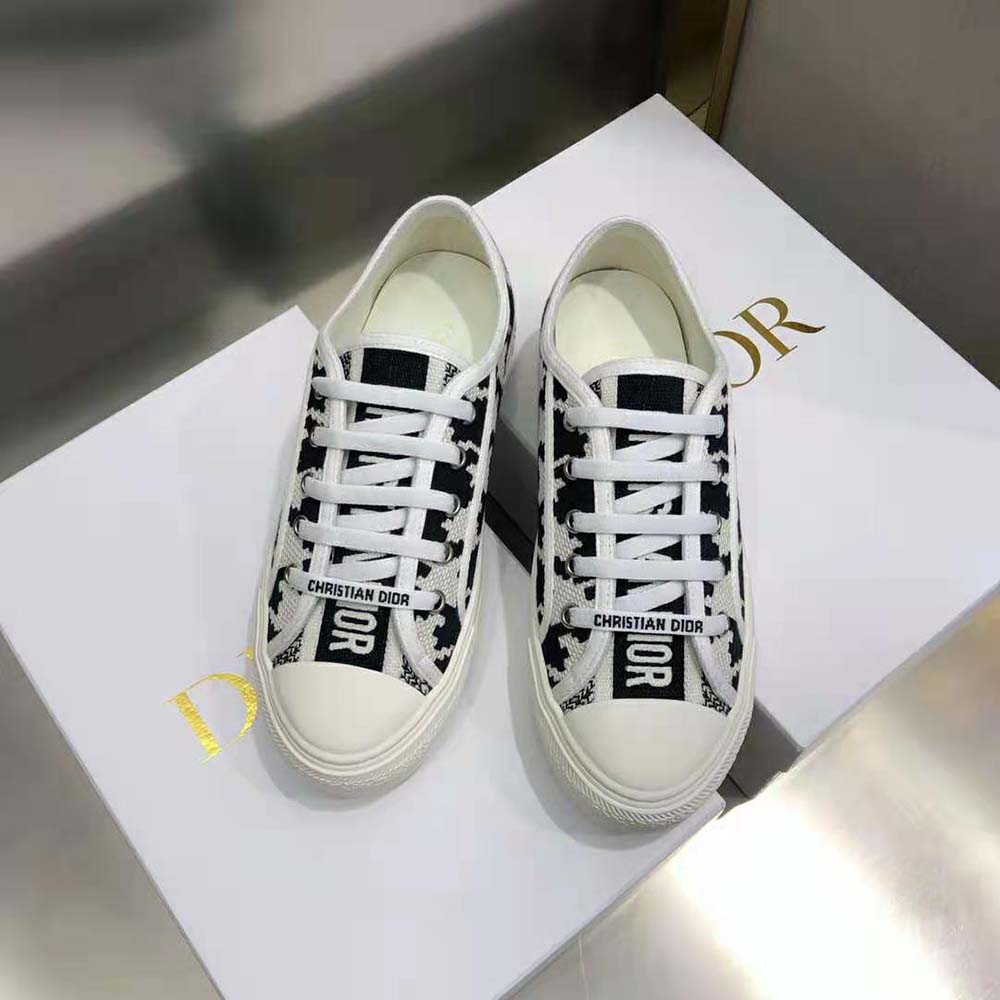 Close-up of macro houndstooth motif on Dior Women Walk’N’Dior Sneaker