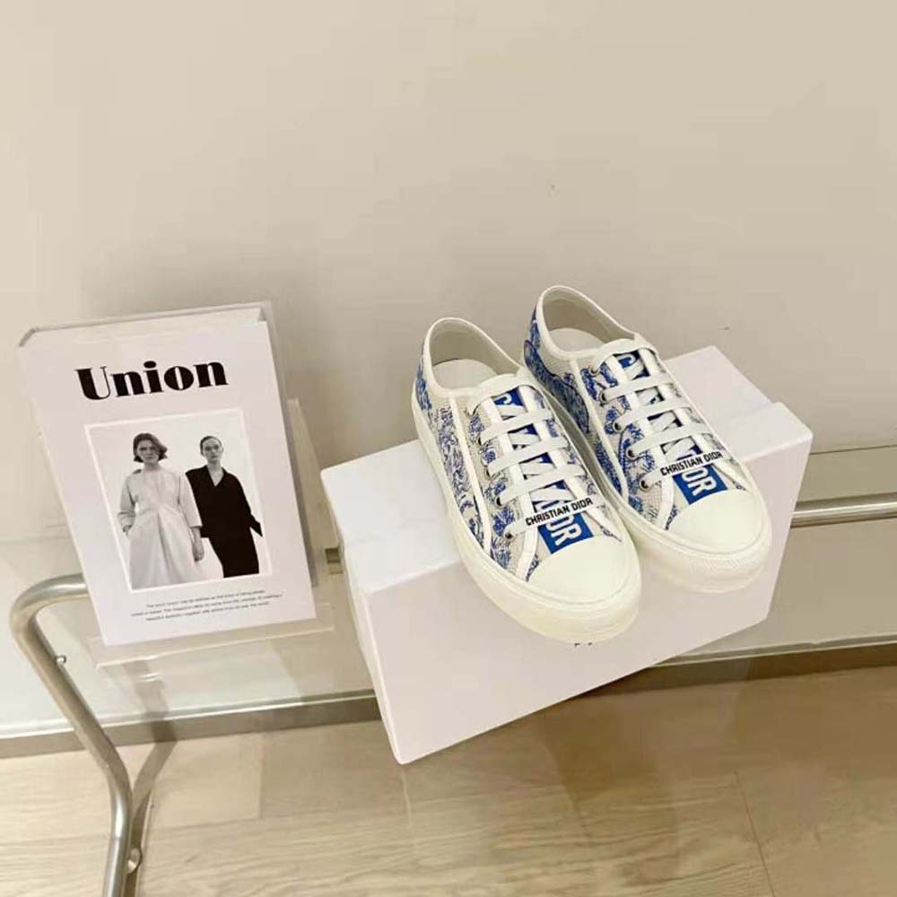 Top view showing laces and silhouette of Dior Women Walk’N’dior Sneaker in bright blue