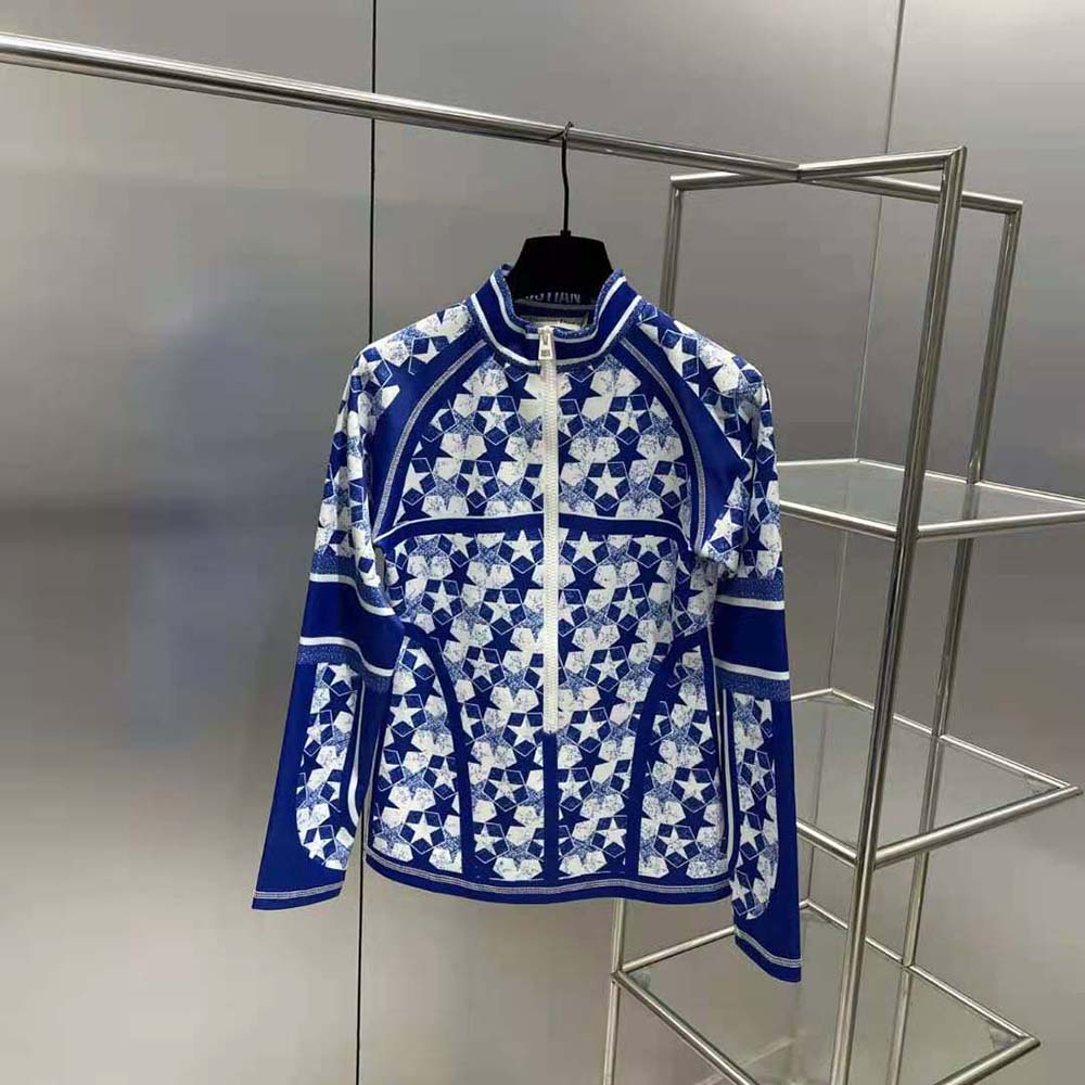 Side shot showing slim fit and vibrant blue colour of jacket