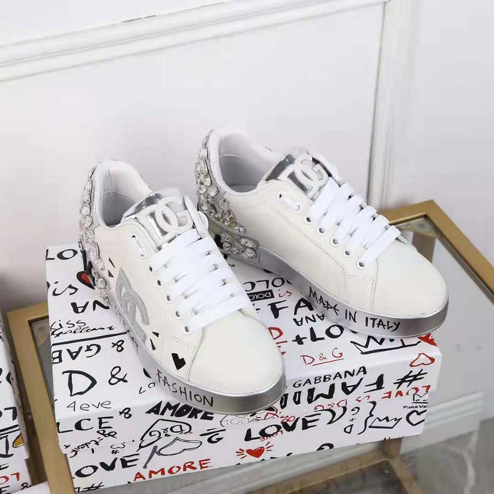 Close-up of DG logo embroidery on silver Dolce Gabbana D&G Portofino Sneakers