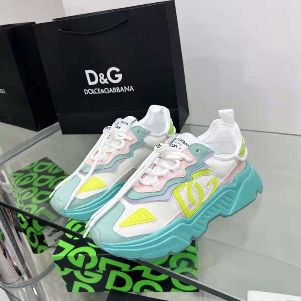 Top-down shot highlighting lace-up closure and D&G logo hardware on Daymaster sneakers