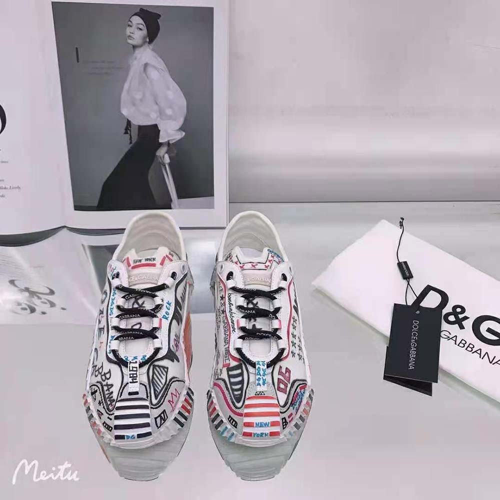 Close-up on embossed D&G logo on blue Dolce Gabbana D&G New York NS1 Slip-on Sneakers