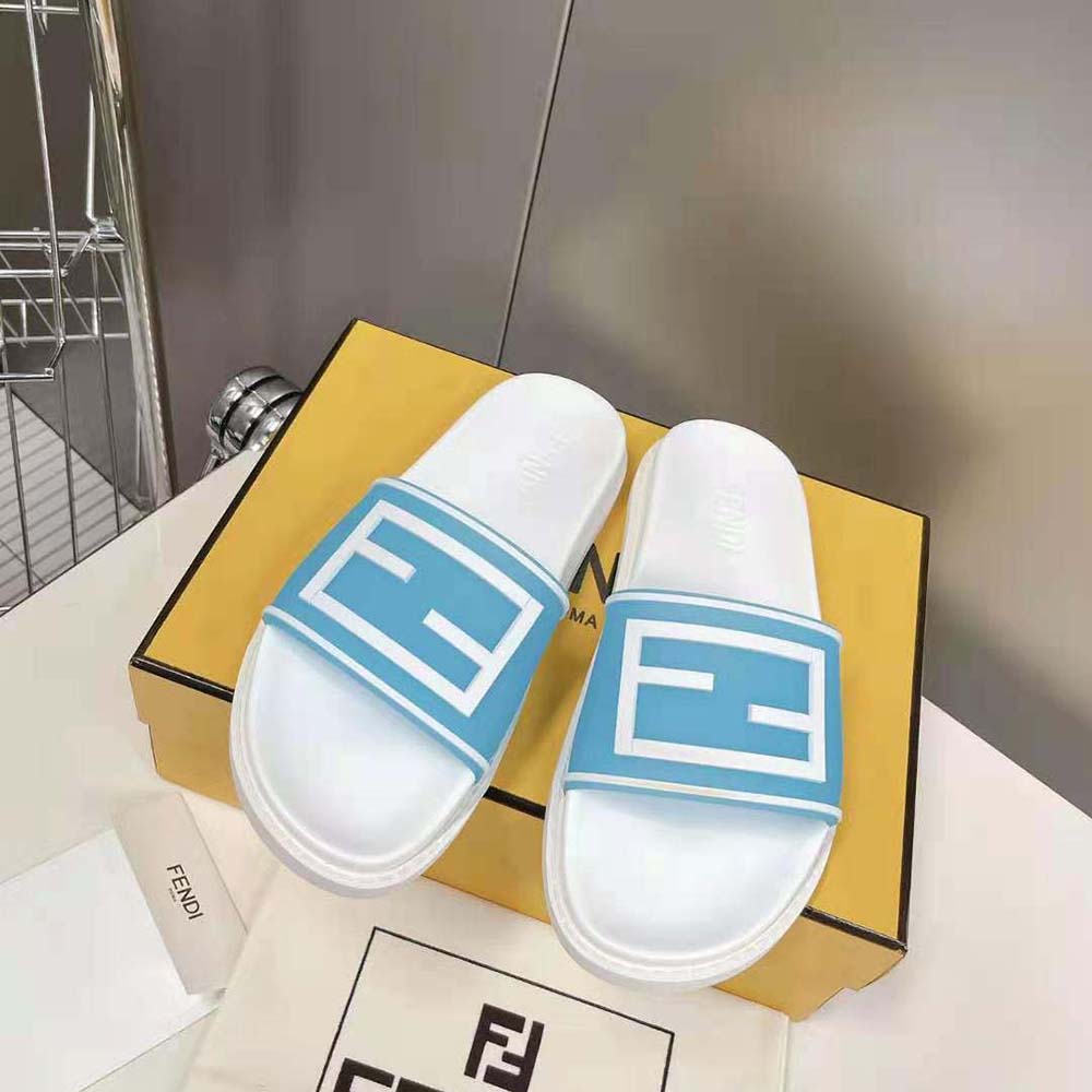 Close-up of embroidered Fendi logo on strap of rubber slides