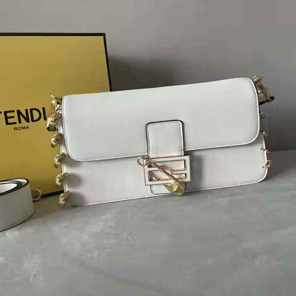Side angle showing compact silhouette of Fendi Women Baguette Brooch bag