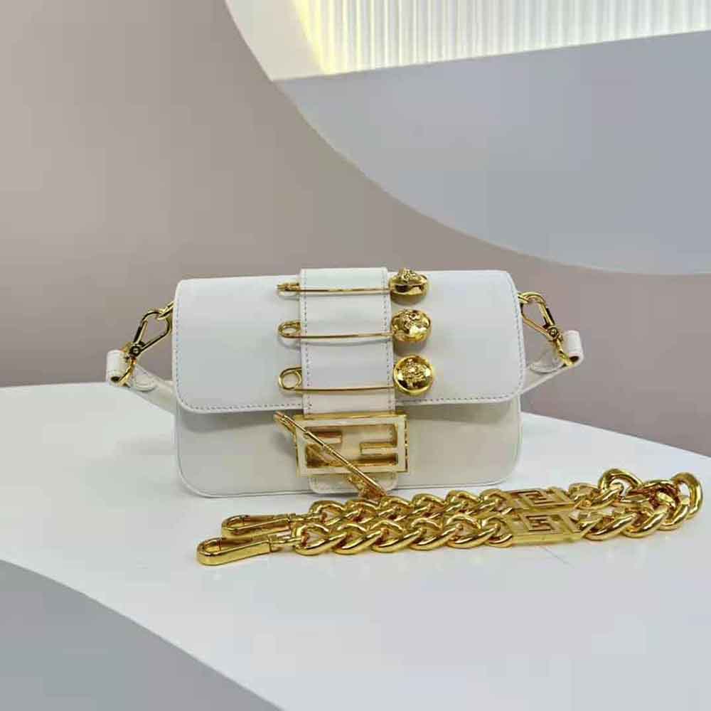 Side angle showing silhouette of Fendi Women Brooch Mini Baguette Fendace White Leather Bag