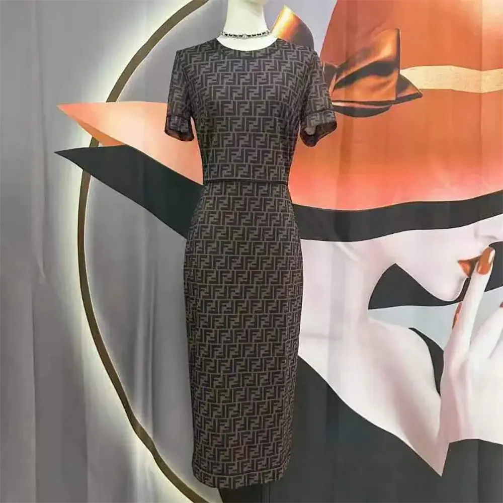Close-up detail of micro mesh fabric and branded hardware on Fendi dress