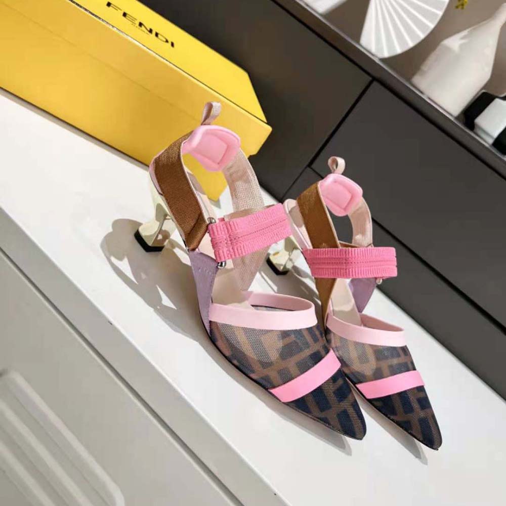 Rear angle highlighting medium heel and adjustable pink slingback strap