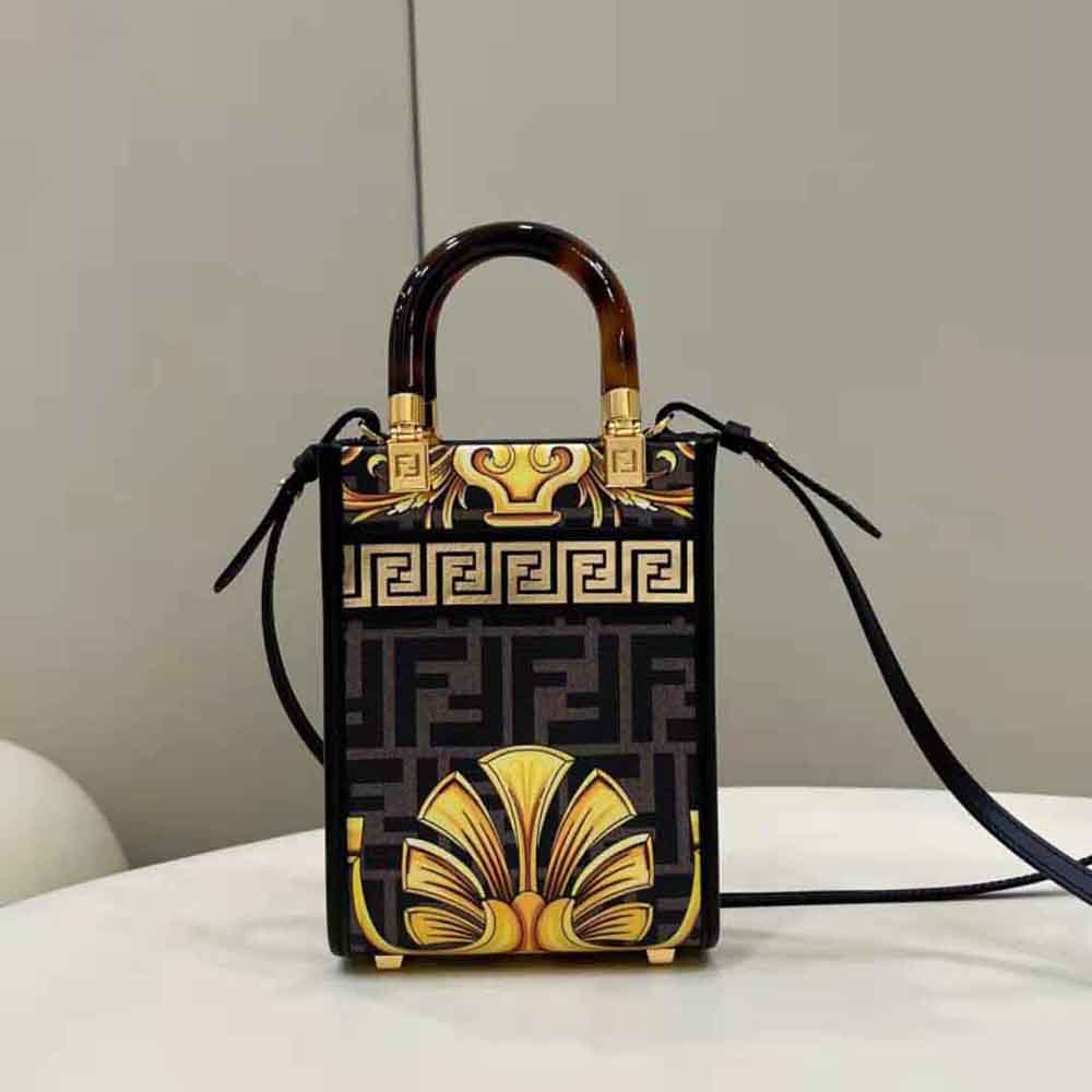 Side profile showing silhouette of Fendi Women Mini Sunshine Shopper Fendace Printed FF Leather bag
