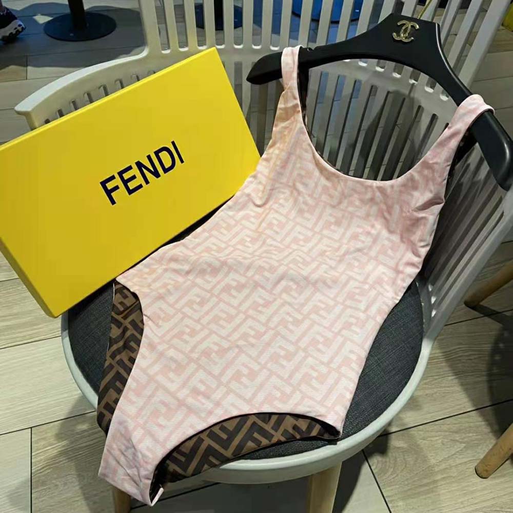Close-up of Fendi logo detail on pink Lycra swimsuit fabric