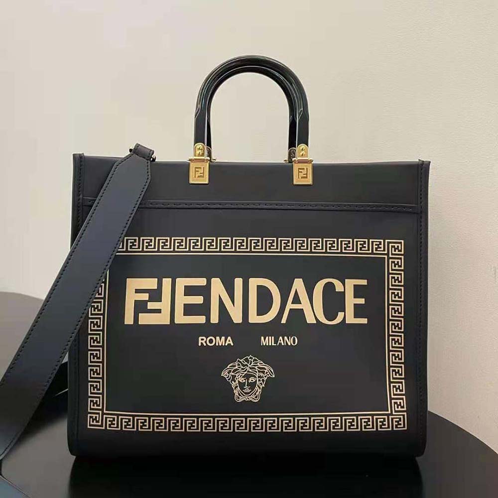 Close-up of gold-tone hardware on Fendi Women Sunshine Medium Fendace Shopper