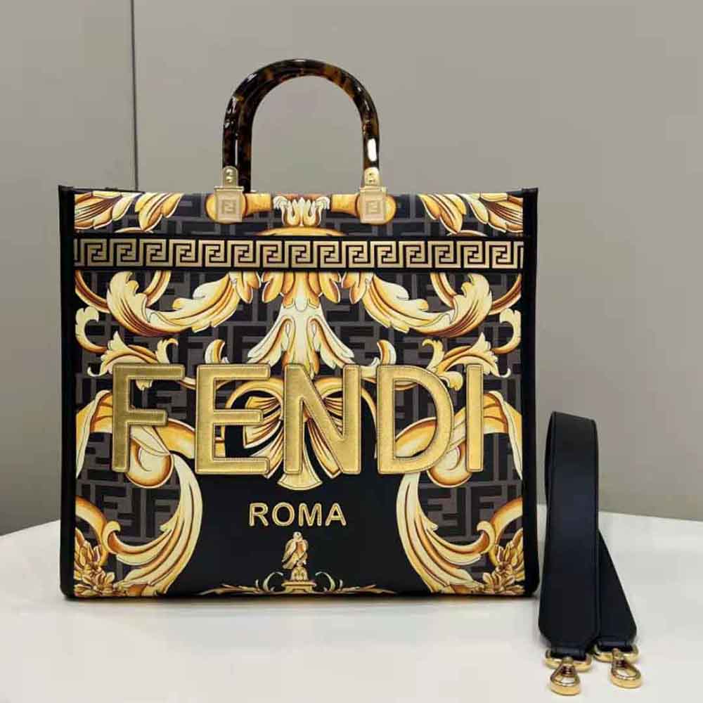 Close-up of gold hardware on Fendi Women Sunshine Medium Fendace Printed FF Leather Shopper