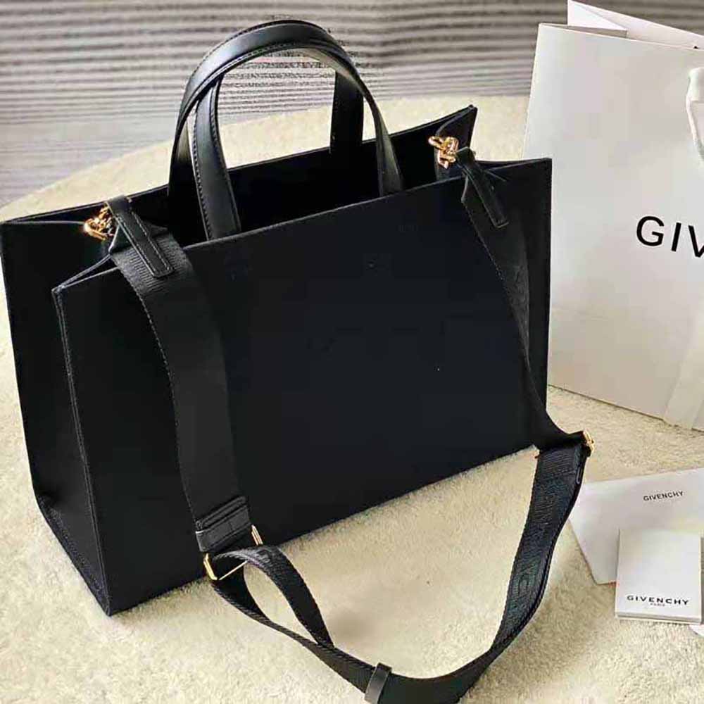 Side angle showing leather handles of Givenchy Women Medium G Tote Bag