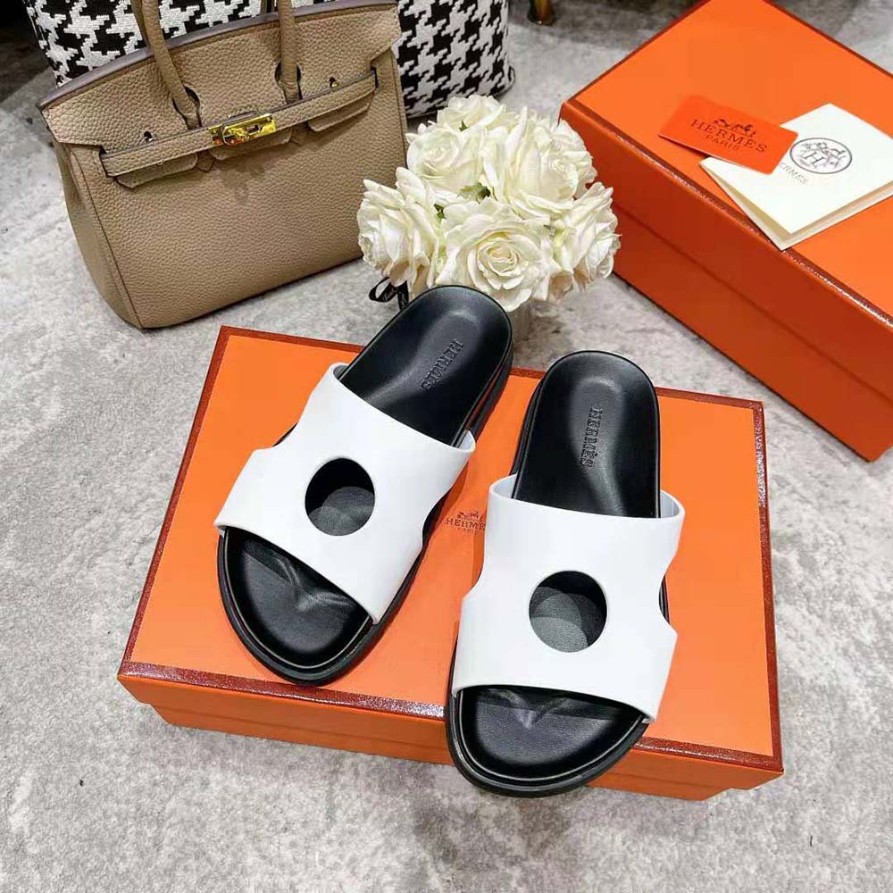 Top view showcasing slip-on design of Hermes Women Edith Sandal in white