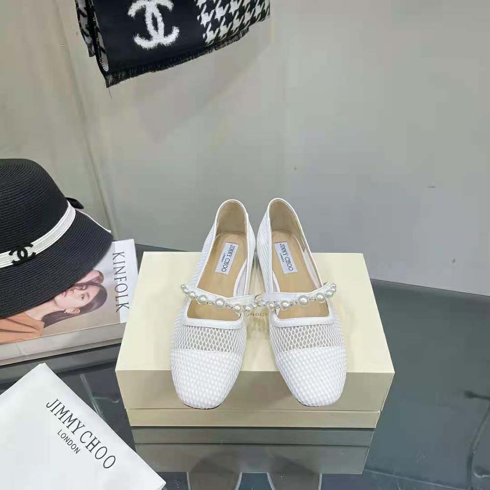 Close-up of pearl-embellished strap on Jimmy Choo Women Ade Flats