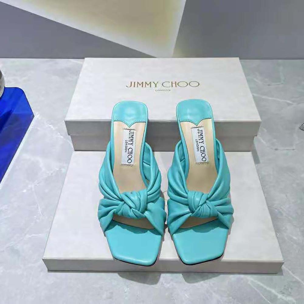 Close-up of blue nappa leather and signature heel detail