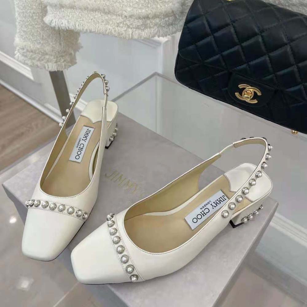 Back angle showing adjustable strap of Jimmy Choo Women Hya 45 Latte slingbacks