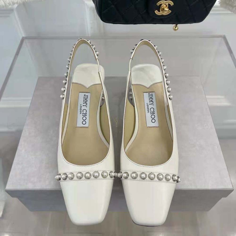 Close-up on pearl stud detailing of Jimmy Choo Women Hya 45 slingbacks