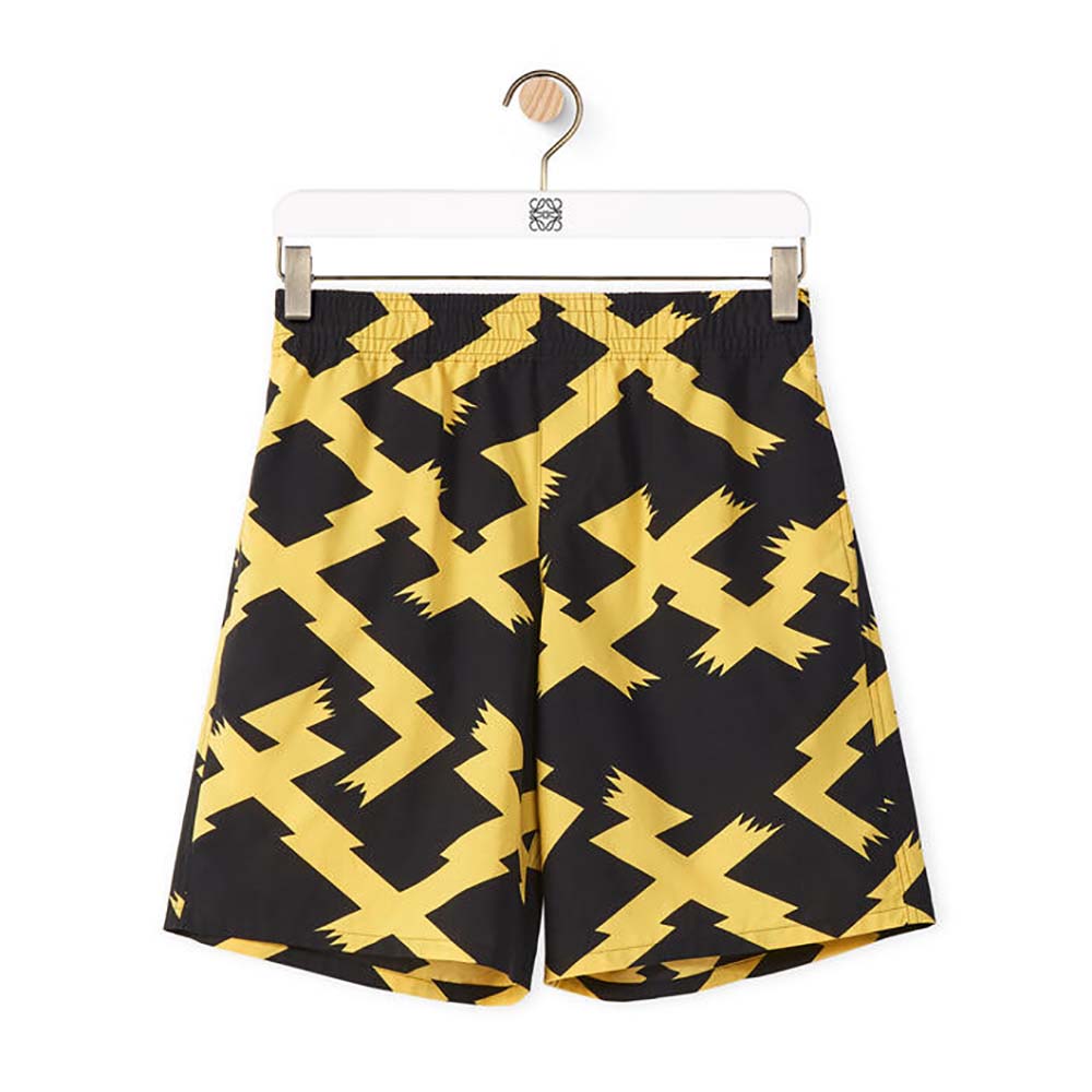 Front view of Loewe Men Allover Print Shorts in yellow cotton