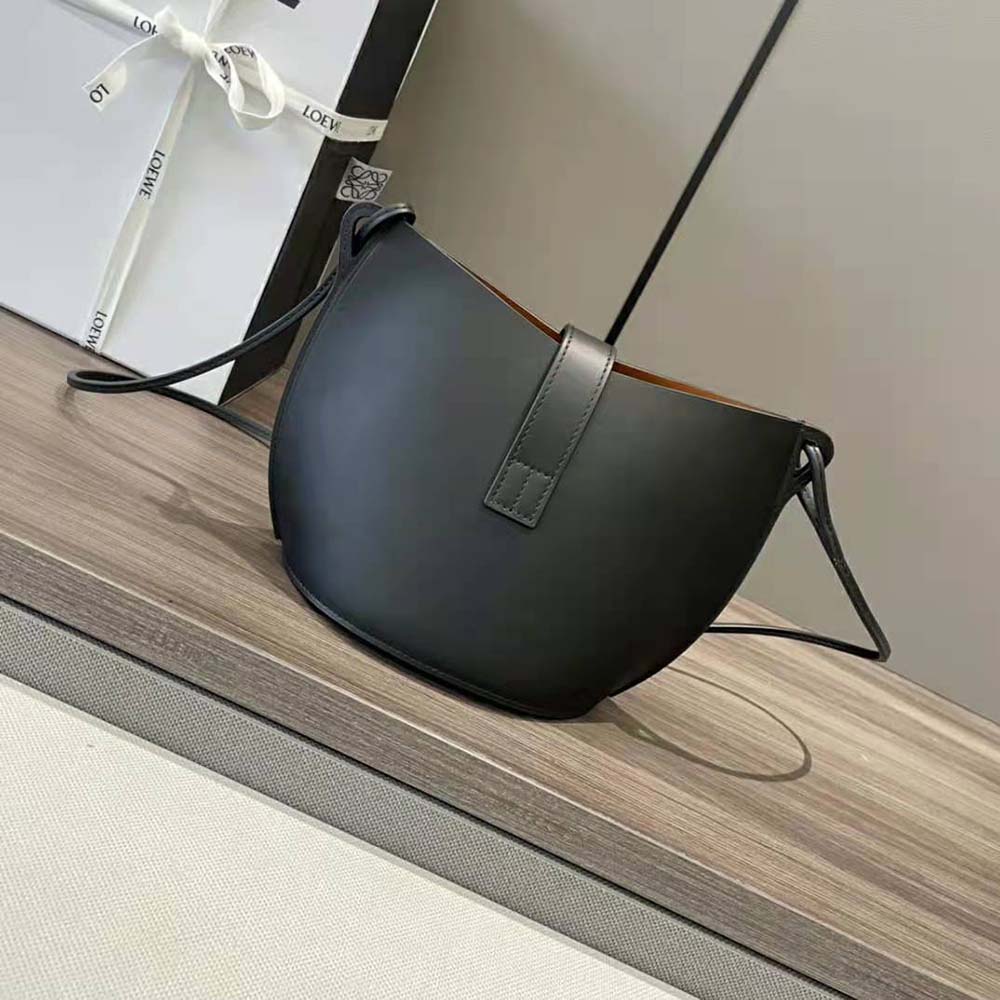 Side profile showing structured silhouette of Loewe Women Bucket Bag