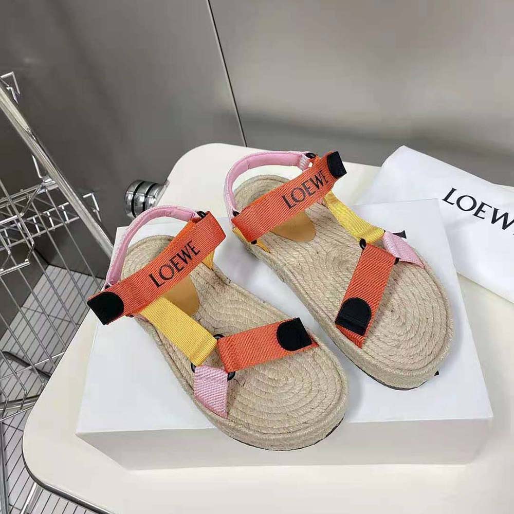 Top view showcasing rope sole and orange nylon upper details