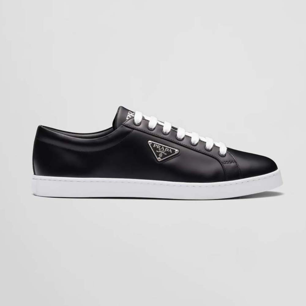 Side view of Prada Men Brushed Leather Sneakers-Black showing sleek silhouette