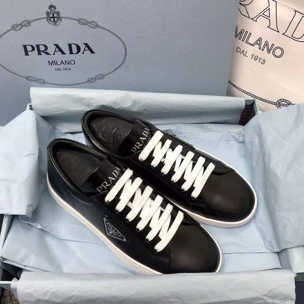 Top angle highlighting the low-top shape and Prada embossed heel