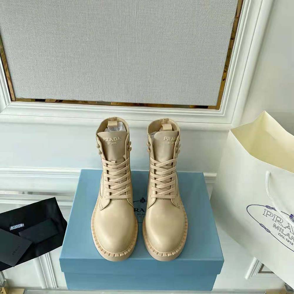 Front angle showing lace-up closure on Prada Women Boots