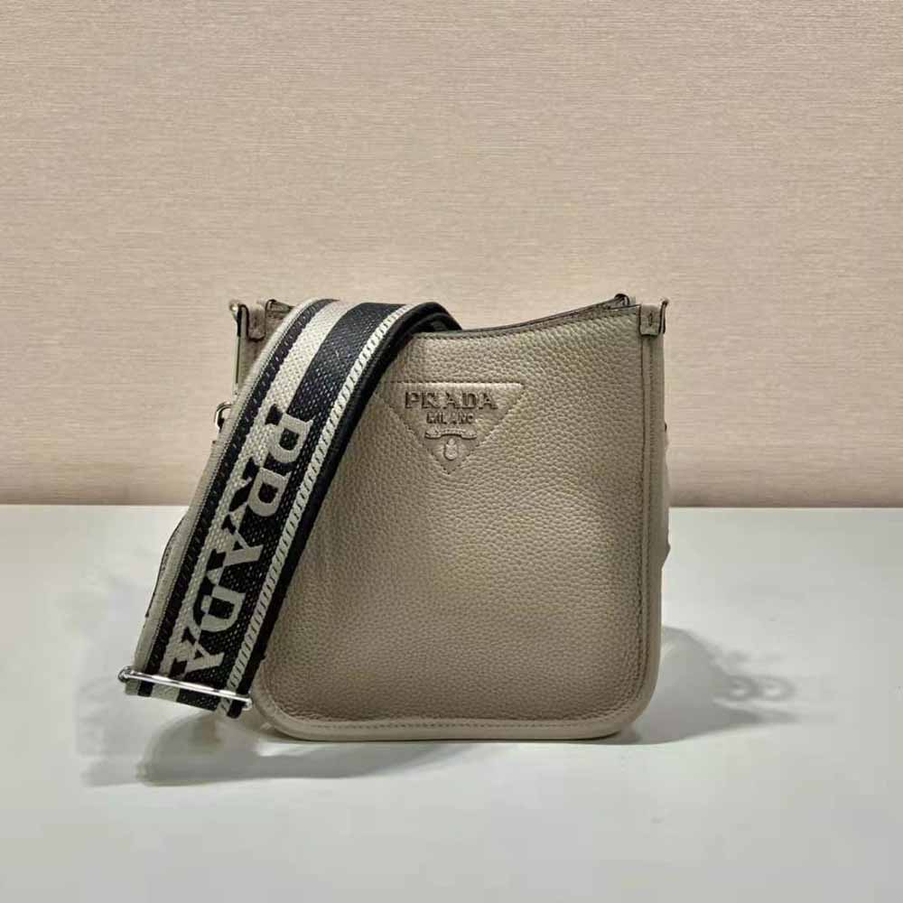 Close-up of flap closure and silver hardware on Prada Unisex Leather Mini Shoulder Bag-Grey