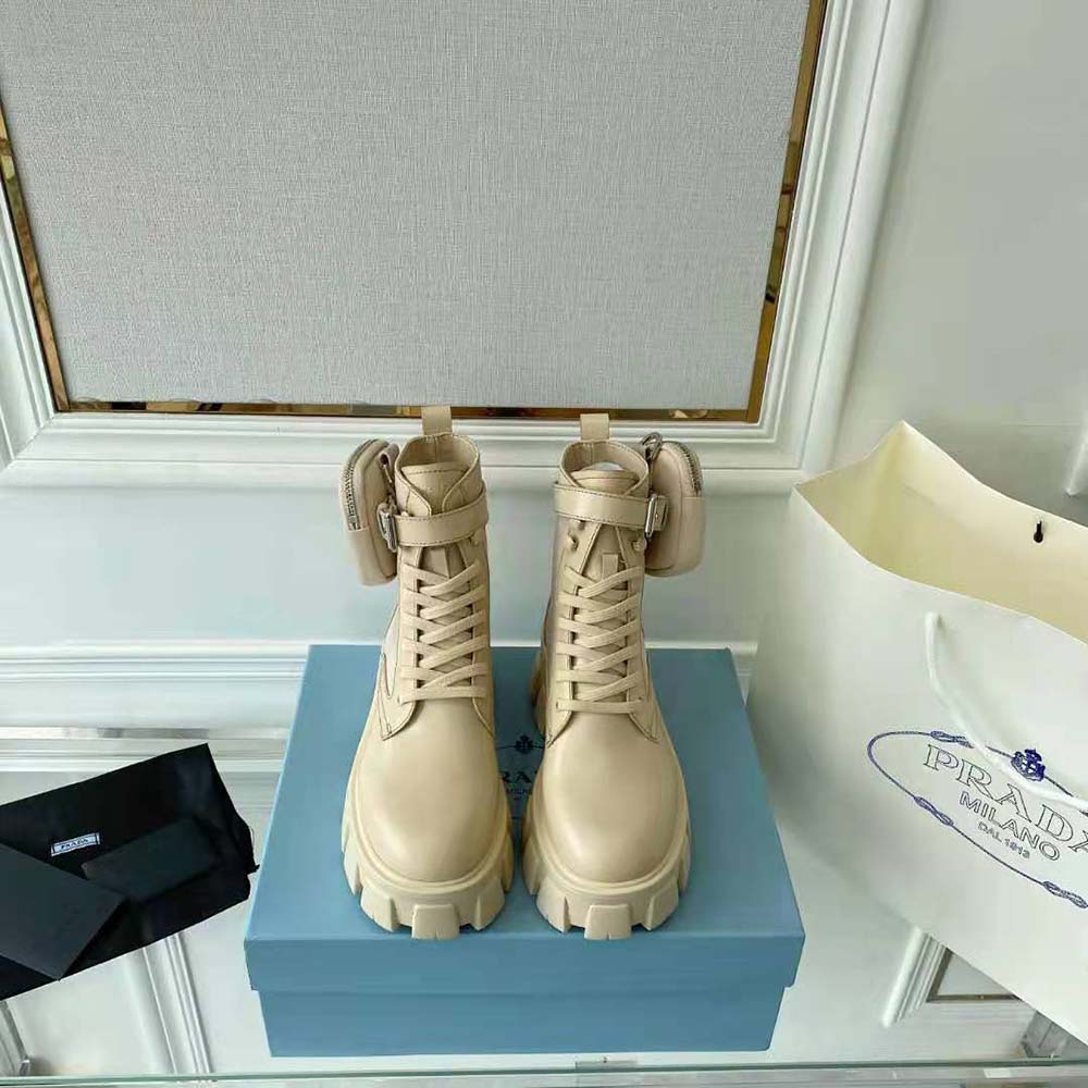 Close-up of lace-up closure and rubber sole on Prada Women Monolith Boots