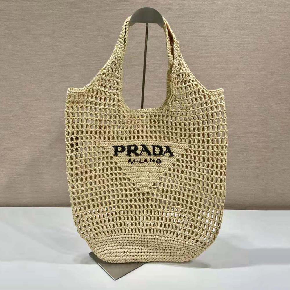 Close-up of woven raffia texture on Prada Women Raffia Tote Bag