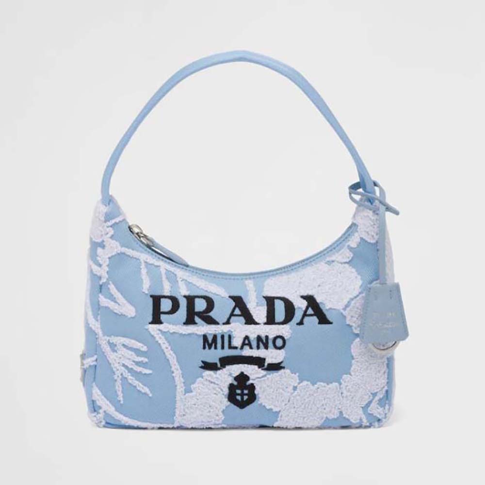 Front view of Prada Women Re-Edition 2000 Embroidered Drill Mini Bag-Blue with zipper